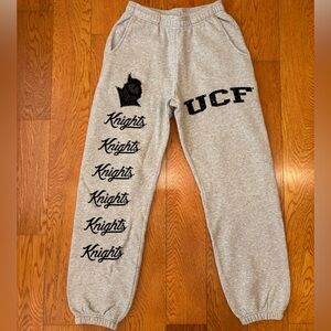 Cactus Jack × Mitchell & Ness UCF Knights
Sweatpants Size Small by Travis Scott